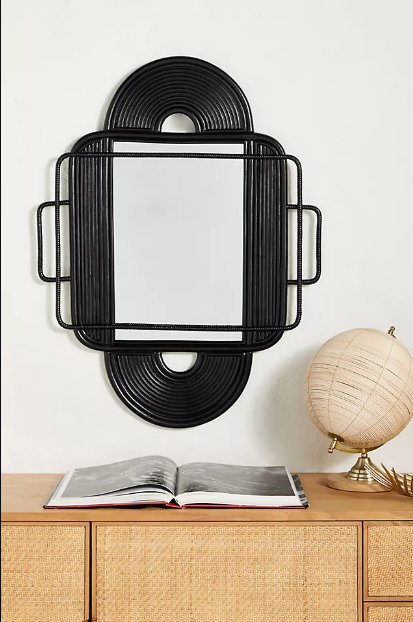 Scuplted rattan mirror